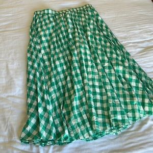 Green plaid, pleated midi skirt. Never worn.